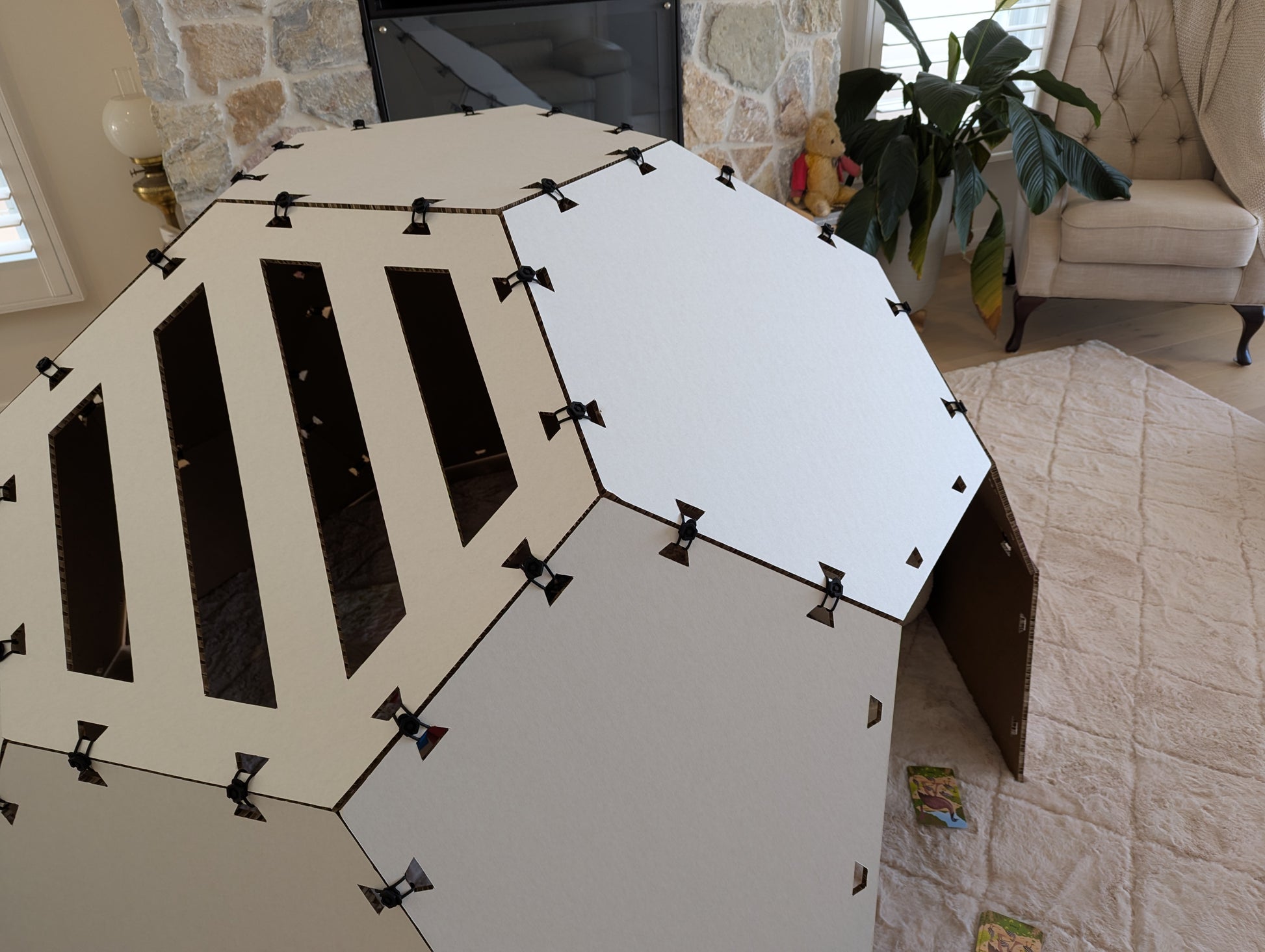 Big Pod assembly process showing hexagonal and pentagon panels with silicone ties